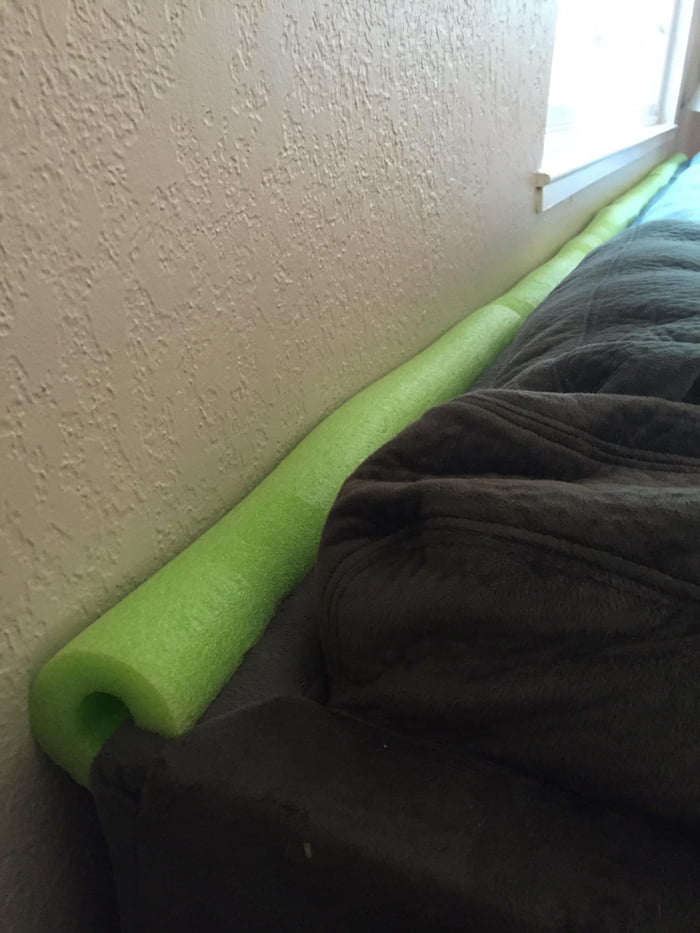 How to keep stuff from falling behind the couch. 9GAG