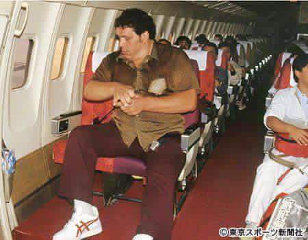 Andre the giant flying out of Japan, 1980