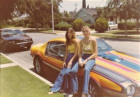1980's girls in USA sitting on car