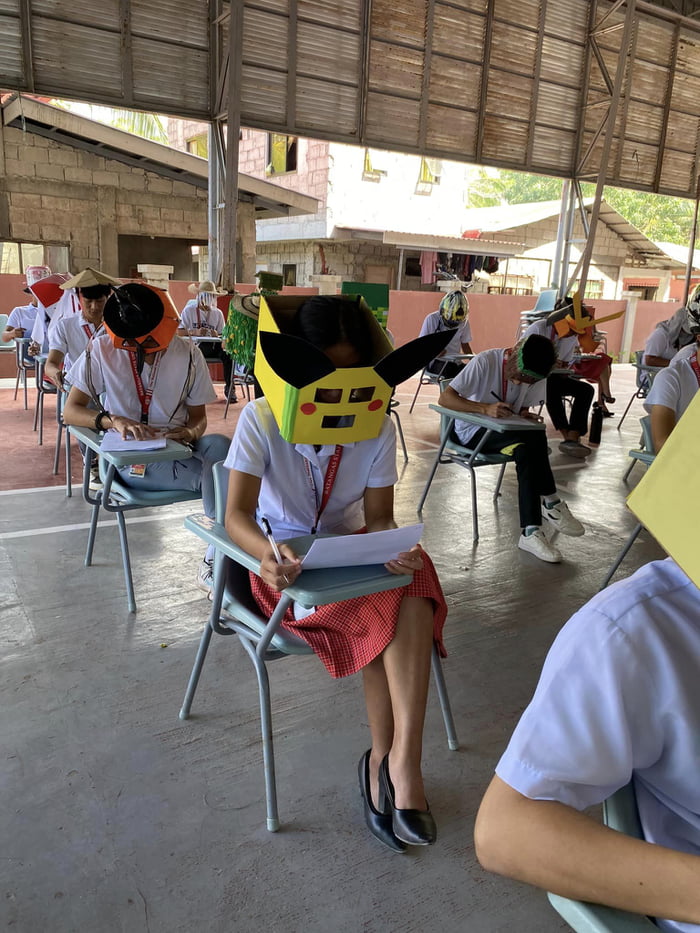 Filipino University Students' Anti-Cheating Exam Hats Go Viral - 9GAG