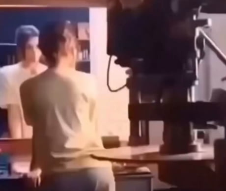 Why we dont see camera in the mirror in movies