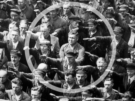 August Landmesser refuses to perform a Nazi salute in 1936