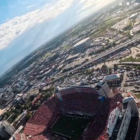 Heres what a successful parachute jump into a college football game looks like