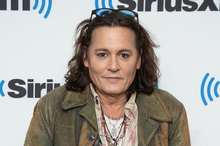 Jonny Depp without his beard looks like the aunt, that gave you your ...