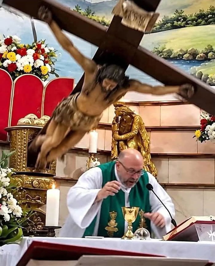 A priest Pepsi from a cross falling on his head in Ecuador