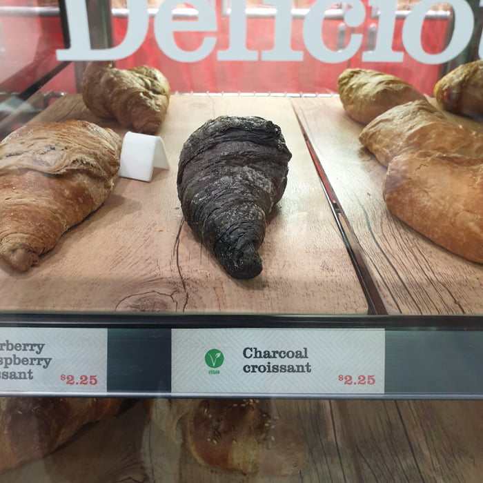 This charcoal craze is pretty weird it's just burnt croissant that they're trying to make an easy buck off.