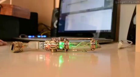 This is just ordinary usb flash drive 3.0 with motorized steampunk DNA model