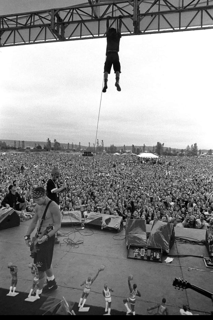 Eddie Vedder hanging from the rafters, at the Drop in the Park concert ...
