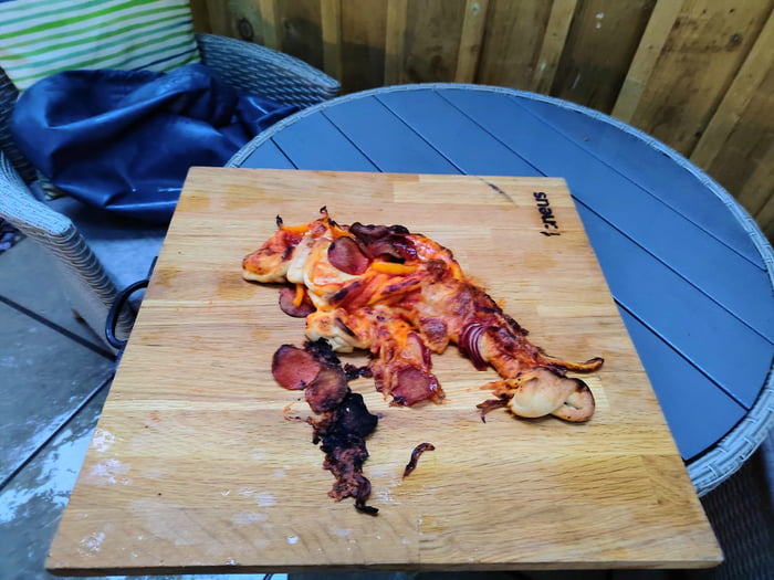 First attempt at using a wood fired pizza oven 9GAG