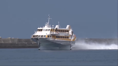 230-seat Boeing 929 Jetfoil arriving at Nishinoomote Port in Japan. The passenger ship is used for high-speed service between Kagoshima and Yakushima.