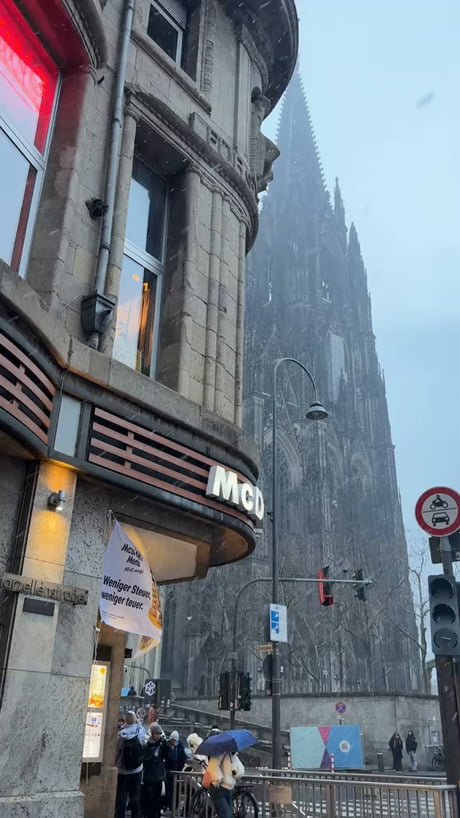 Me eating at the McDonald’s looking at the cathedral