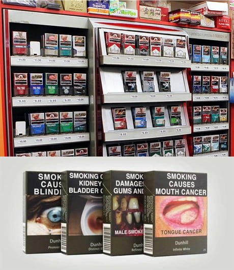 singapore cigarette pack packaging morbid graphic cigarette packages at convenience store in Singapore Stock Photo Tobacco products in Singapore must