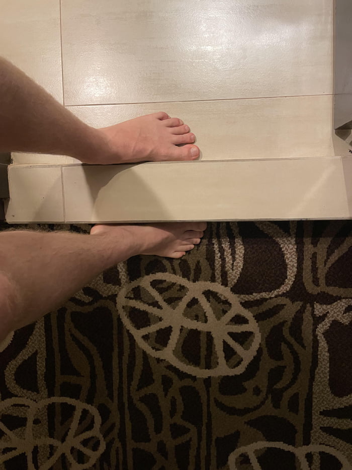 Twoway curbed hotel bathroom; if you didn’t hurt yourself enough on