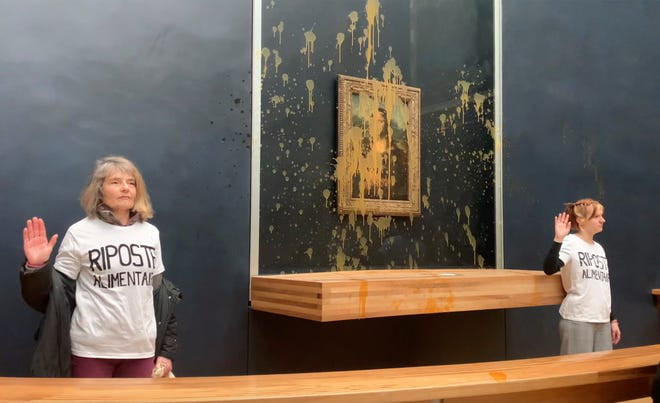 2 Climate Activists Arrested After Throwing Soup At The Mona Lisa ...