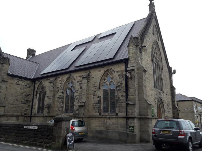 This church has a Christian cross in the negative space in the solar panels.