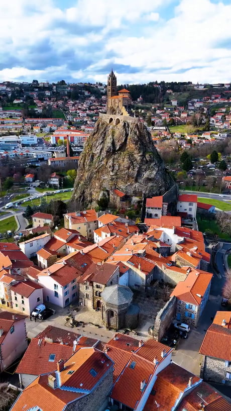 Saint-Michel d'Aiguilhe (St. Michael of the Needle) is a chapel in Aiguilhe, near Le Puy-en-Velay, France. The chapel is reached by 268 steps carved into the rock. It was built in 969 on a volcanic plug 85 metres (279 ft) high.