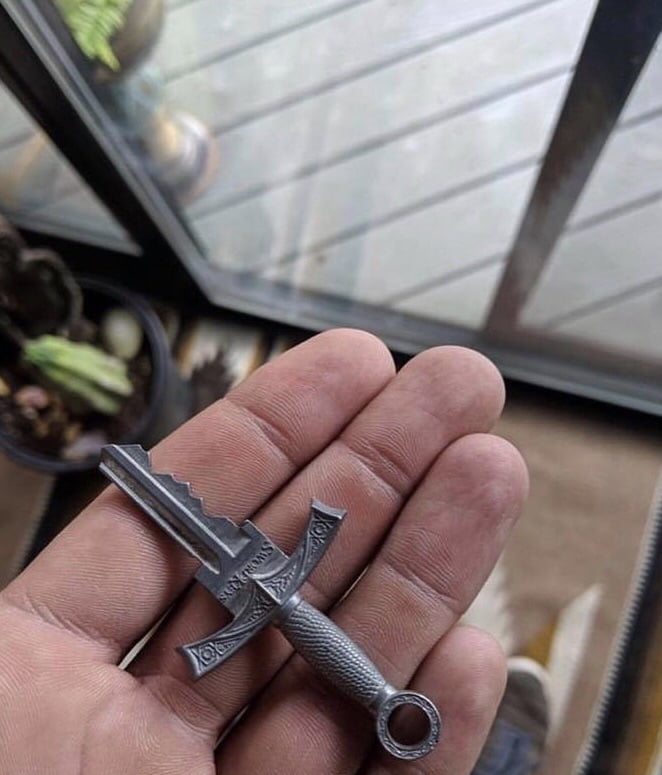 My friends house key is shaped like a sword.