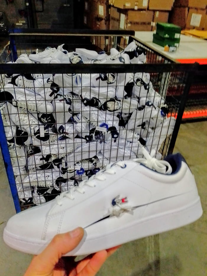 This entire bin full of brand new, intentionally destroyed shoes, destined for landfill. All to prevent reselling and to maintain an artificially high price.