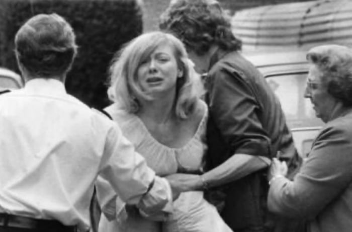 Former beauty Queen, Miss Wyoming winner 1973 Joyce McKinney being arrested by police after kidnapping Mormon missionary Kirk Anderson from his church, forcing him to be her sex slave for 3 days. 1977.