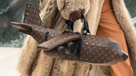 This is the latest $39,000 Louis Vuitton purse. ISIS: *heavy