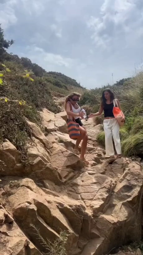 Hiking in a flip-flop, there is only one woman to do it....