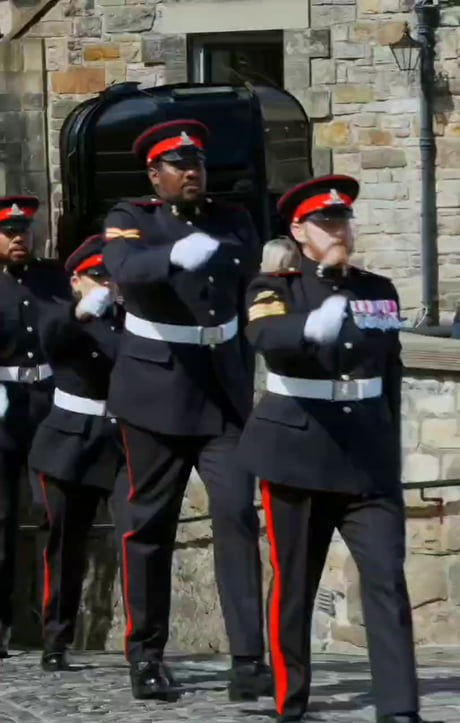 The British Royal Artillery, showing off their unsynchronized marching skills - looks like a comedy sketch.