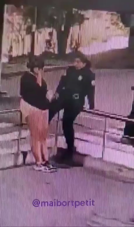 Female officer accidentally shoots a women when showing off her gun.