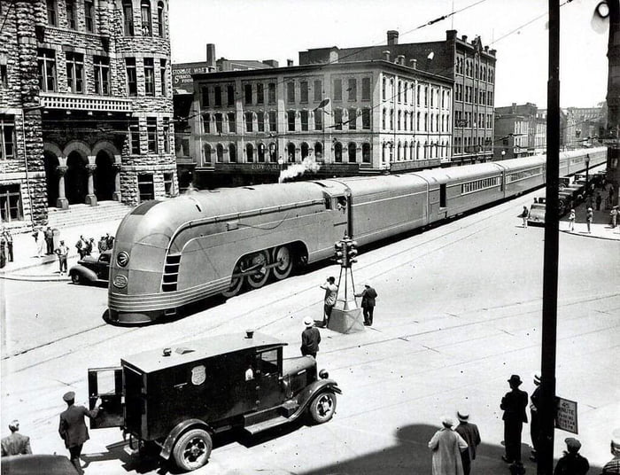 The New York Central Railroad streamliner 'Mercury' passes through Syracuse City Hall. 1936