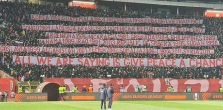 All We Re Saying Is Give Peace A Chance Serbian Fans Listed On The Banners The Countries Where The United States Has Invaded 9gag