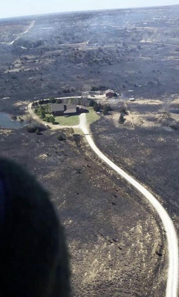 Homeowner turned his sprinklers on before leaving to escape a Kansas wildfire. He came home to this