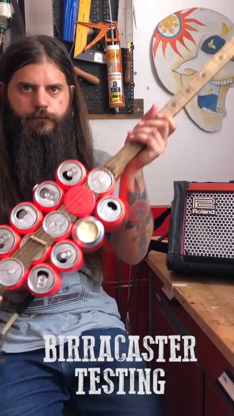 Guy kills it on a guitar made of beer cans... Music and beer sounds good.