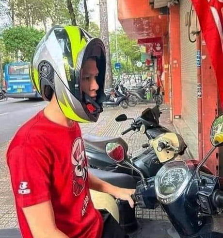 How the f**k did he manage to put his helmet on like that?!