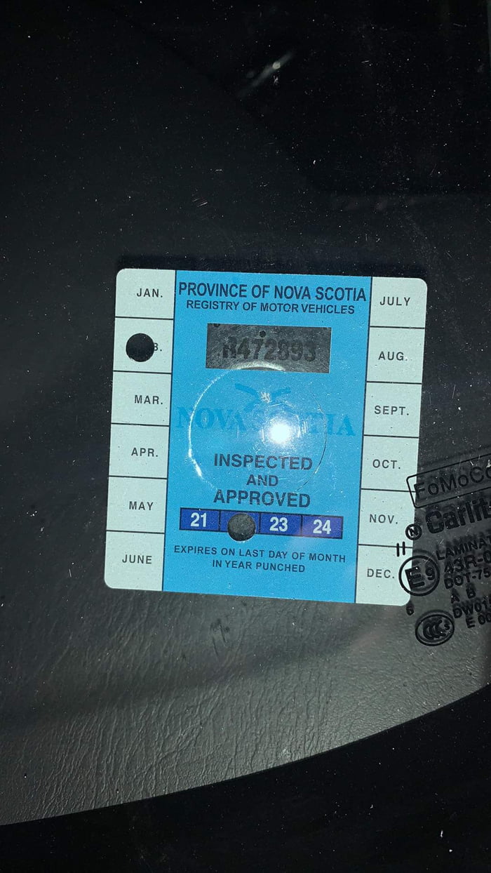 Car with a fake inspection sticker on it, the dealer said it was in
