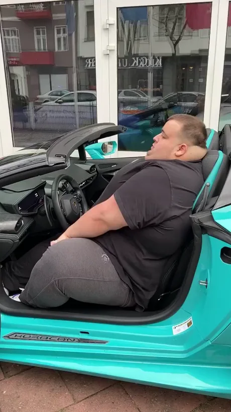 fat man in car