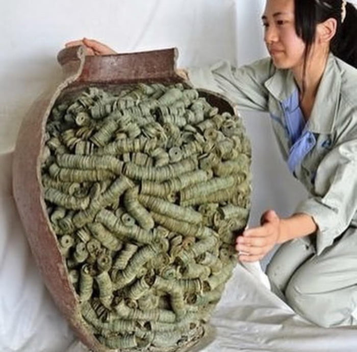 This jar with more than 40,000 coins buried during the medieval age in Japan.