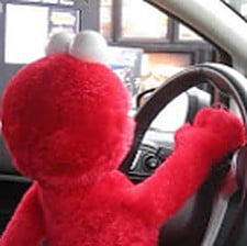 Just Elmo driving a car - 9GAG