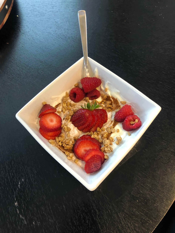 Greek Yogurt with strawberries, raspberries, granola and other spices. 9GAG